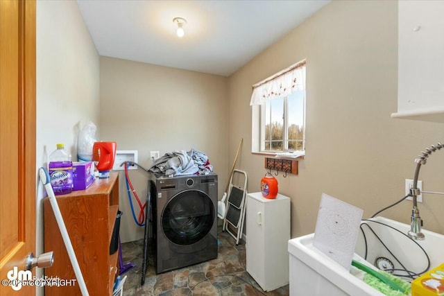 laundry room featuring washing machine and dryer