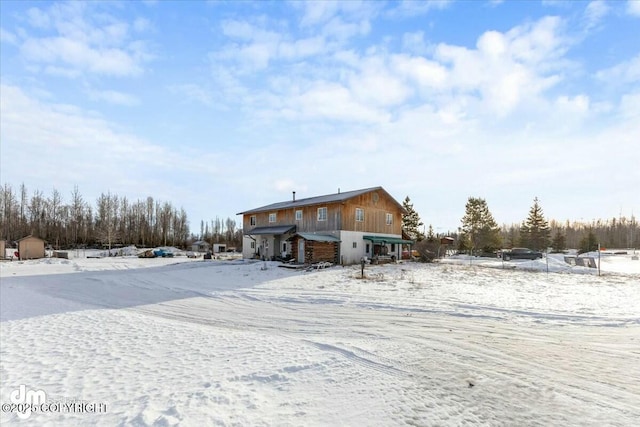 view of snow covered property