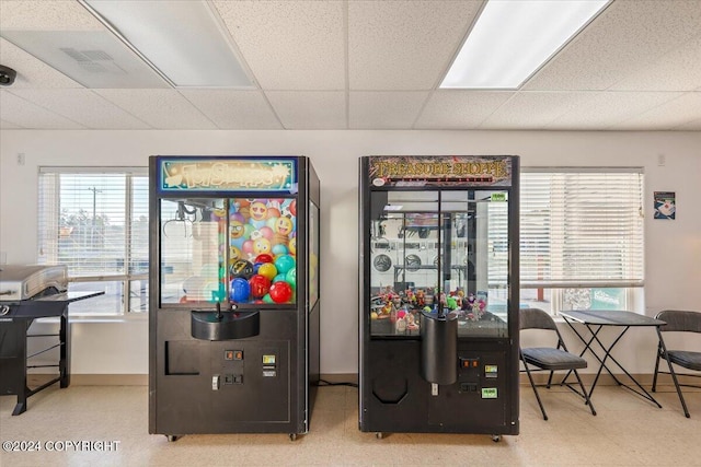 interior space with a drop ceiling