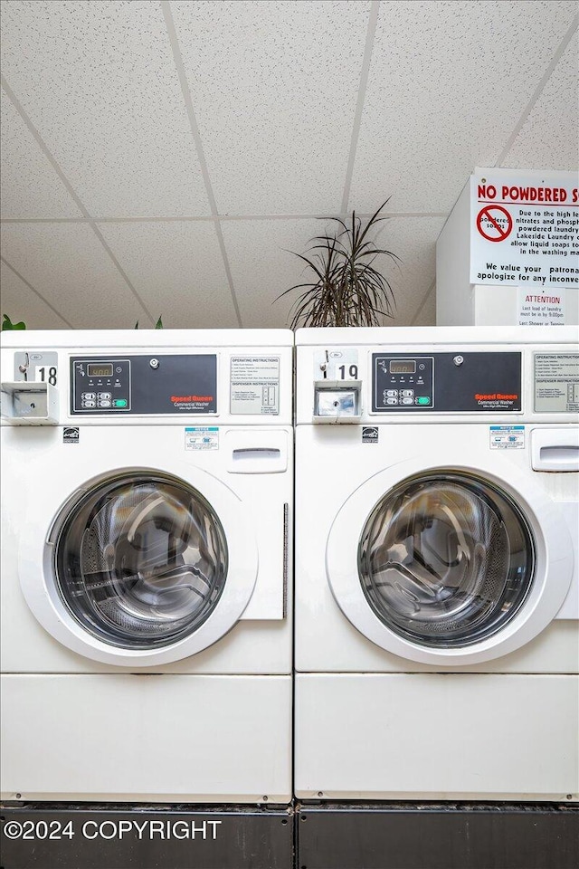 washroom featuring independent washer and dryer