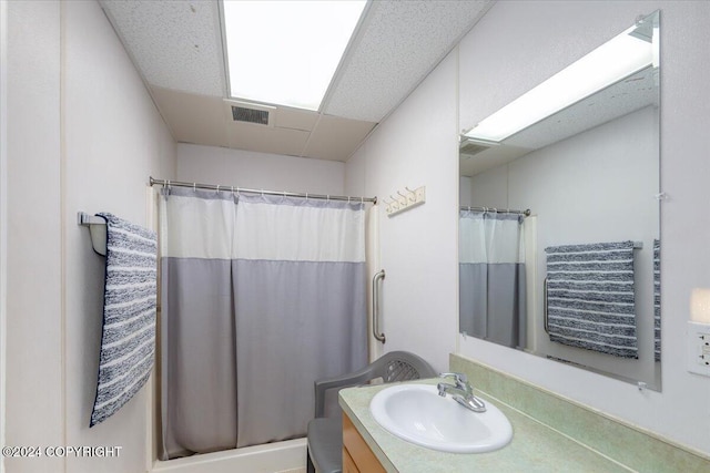3462 S Big Lake Rd, Big Lake, AK 99623 - full bathroom featuring curtained shower, vanity, and a drop ceiling