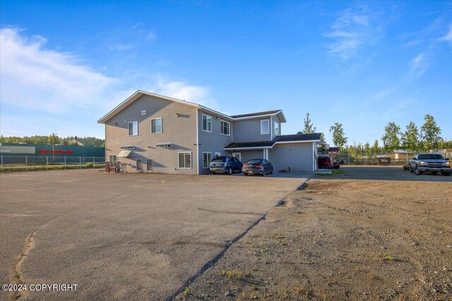 3462 S Big Lake Rd, Big Lake, AK 99623 - view of front of home with fence and uncovered parking