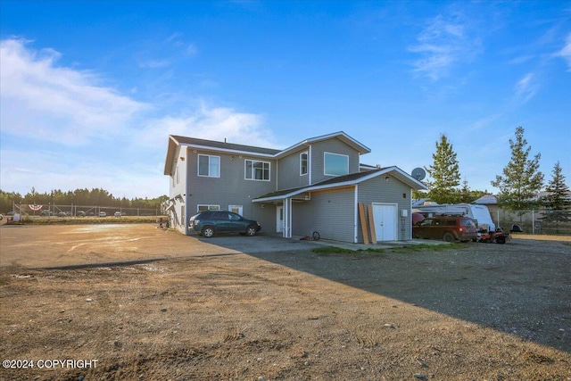 front of property featuring a garage