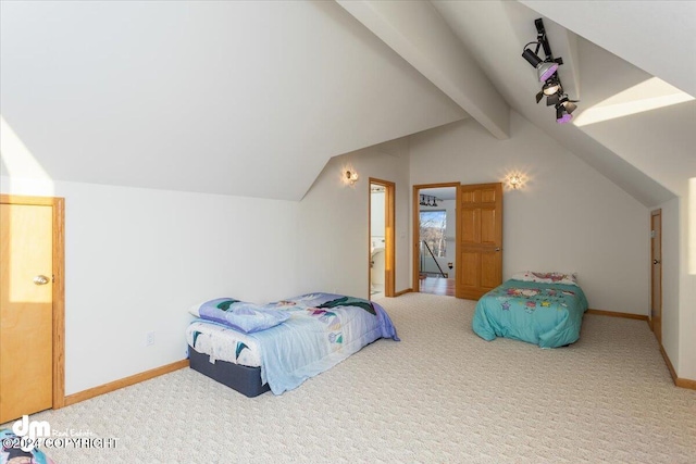 bedroom featuring carpet flooring and lofted ceiling with beams