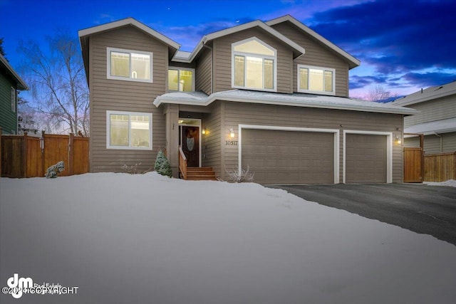 view of front of property with a garage