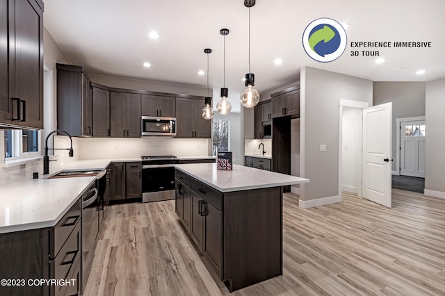 kitchen featuring decorative backsplash, light stone countertops, dark brown cabinets, a kitchen island, and stainless steel appliances