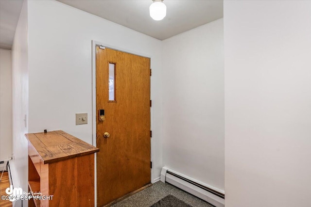 foyer with a baseboard radiator