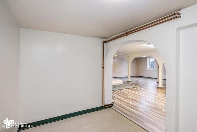 unfurnished room with light hardwood / wood-style floors