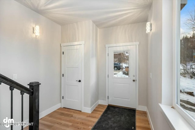 entrance foyer featuring hardwood / wood-style flooring