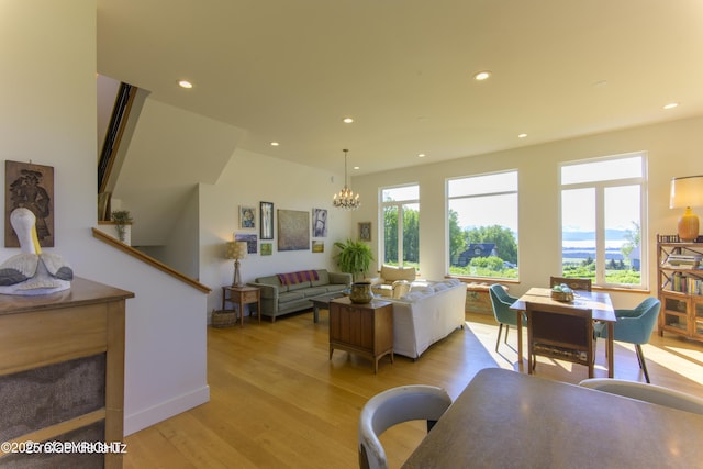 4760 Craftsman Rd, Homer, AK 99603 - living room featuring light wood-style floors, recessed lighting, and a chandelier