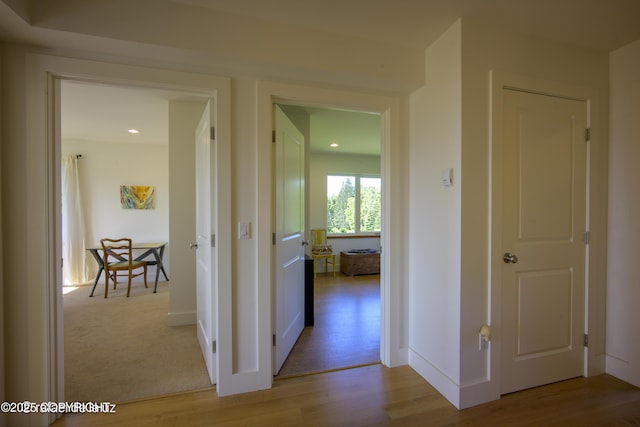 4760 Craftsman Rd, Homer, AK 99603 - hall with wood finished floors, recessed lighting, and baseboards