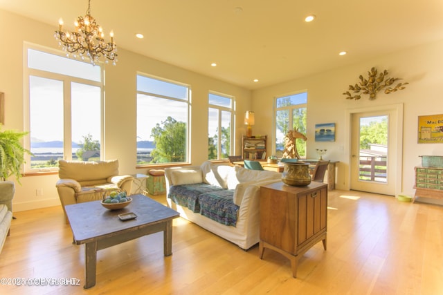 4760 Craftsman Rd, Homer, AK 99603 - living area featuring a chandelier, light wood-style flooring, recessed lighting, and baseboards