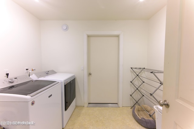 4760 Craftsman Rd, Homer, AK 99603 - laundry room with washing machine and clothes dryer