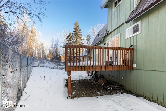 view of snow covered deck