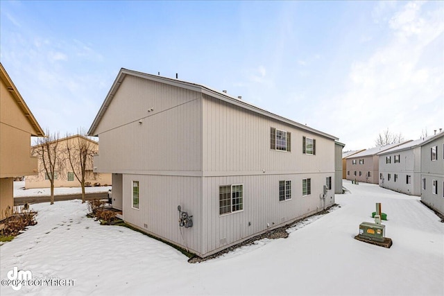 view of snow covered property