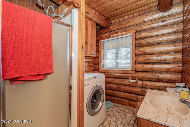 clothes washing area featuring washer / clothes dryer, log walls, and wooden ceiling