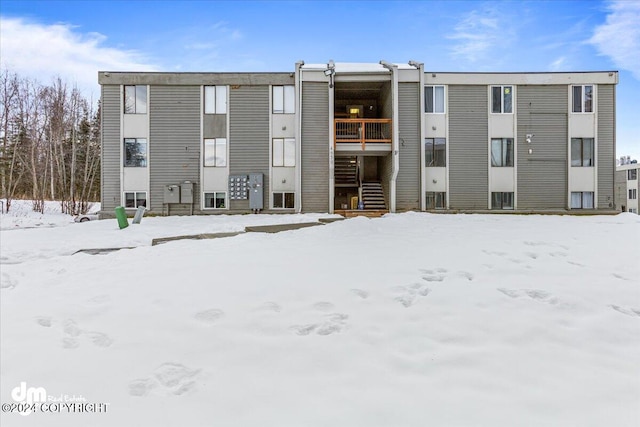 view of snow covered property