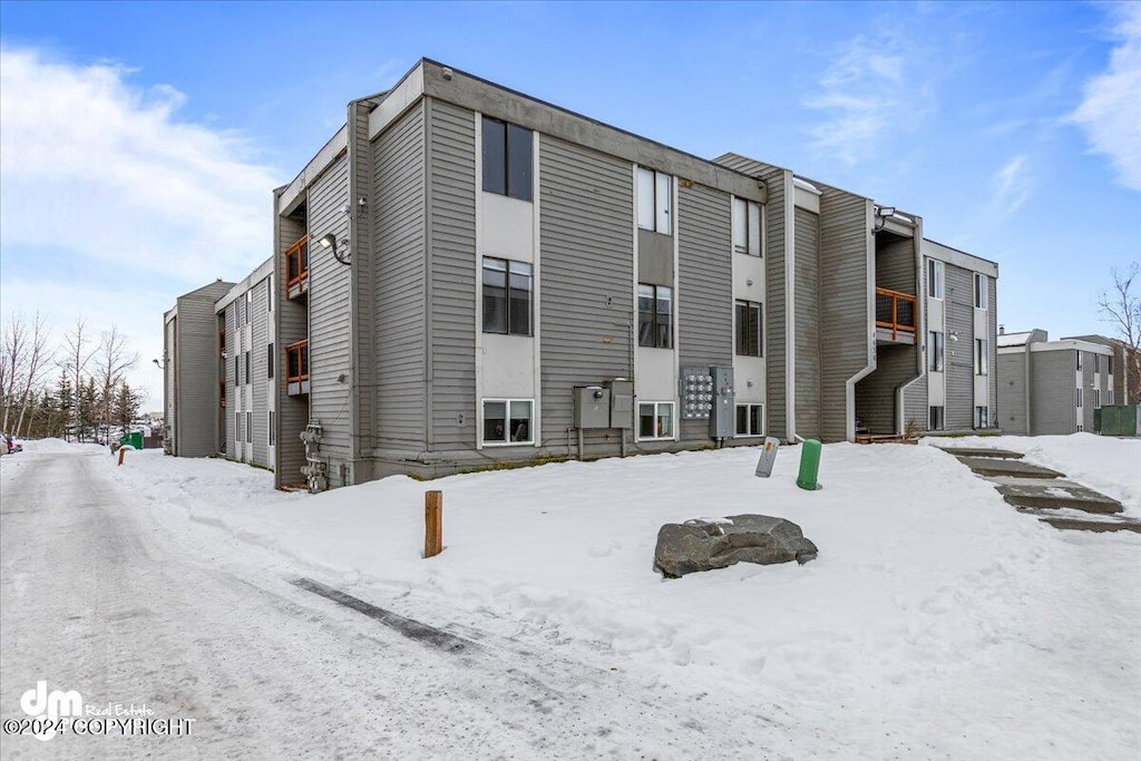 view of snow covered property