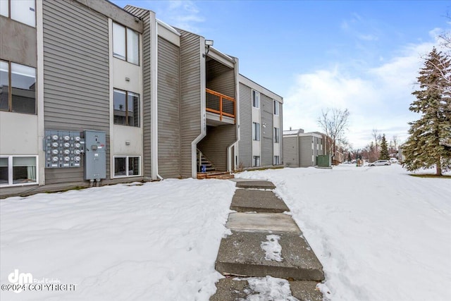 view of snow covered property