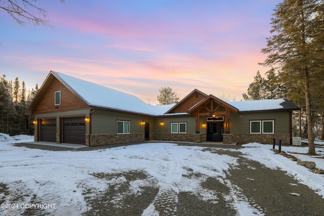 view of front of home with a garage