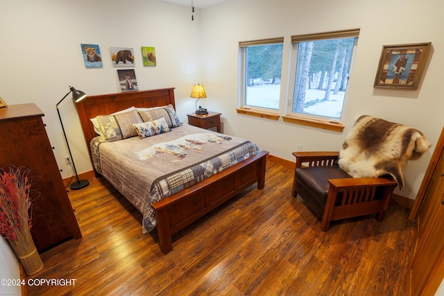 34184 House Dr, Soldotna, AK 99669 - bedroom featuring wood finished floors and baseboards