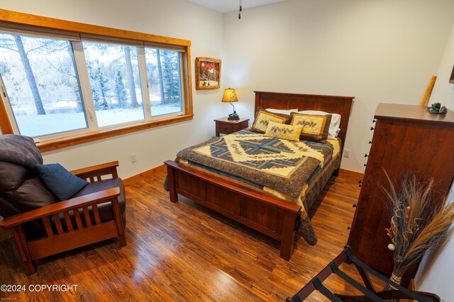 34184 House Dr, Soldotna, AK 99669 - bedroom with wood finished floors and baseboards