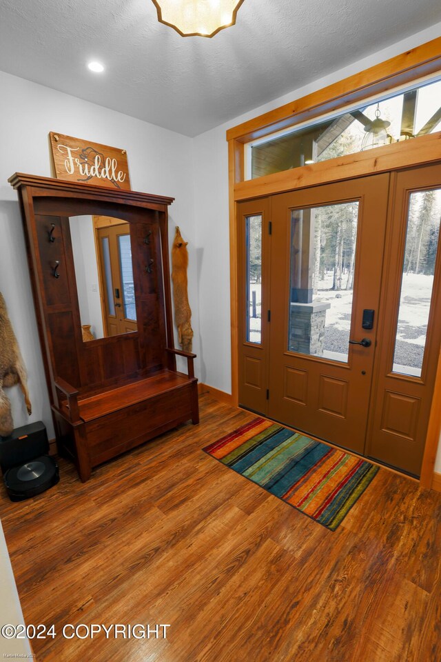 34184 House Dr, Soldotna, AK 99669 - foyer entrance with wood finished floors and baseboards