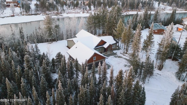 34184 House Dr, Soldotna, AK 99669 - snowy aerial view featuring a view of trees