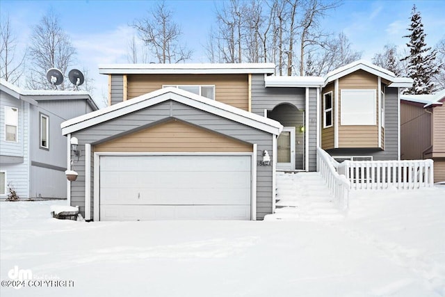 split foyer home featuring a garage