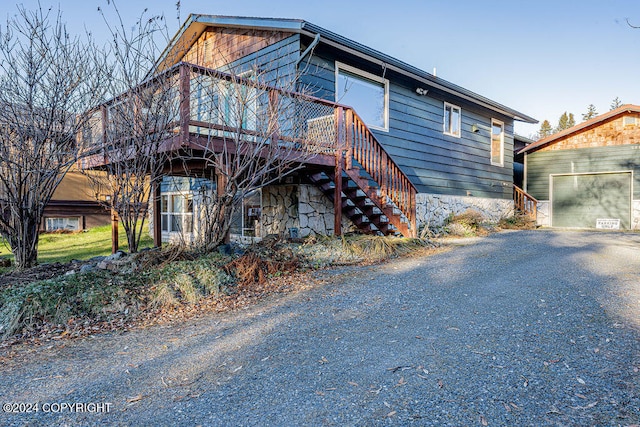 view of front of house with a wooden deck