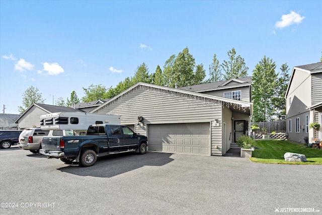 view of front of home with a garage