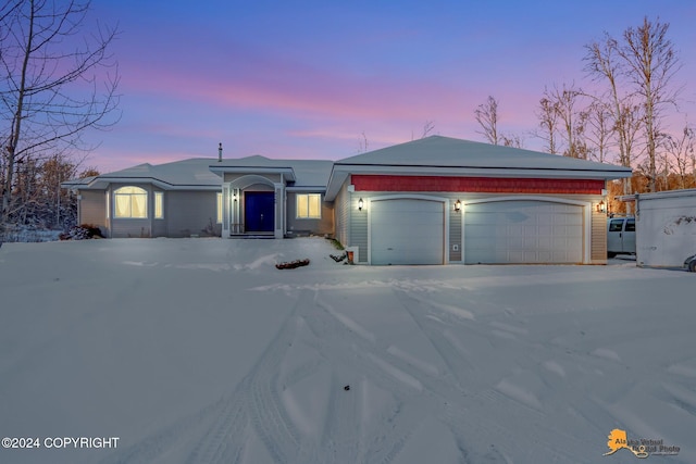 ranch-style house with a garage