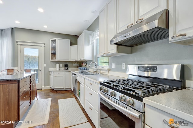 kitchen with white cabinets, sink, and stainless steel appliances