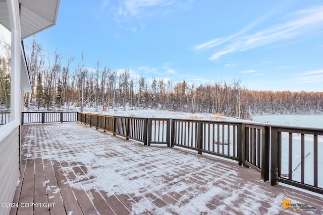 view of snow covered deck