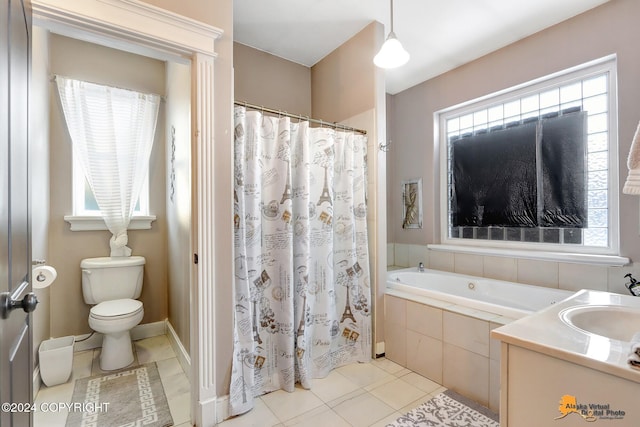 full bathroom with tile patterned floors, vanity, toilet, and independent shower and bath