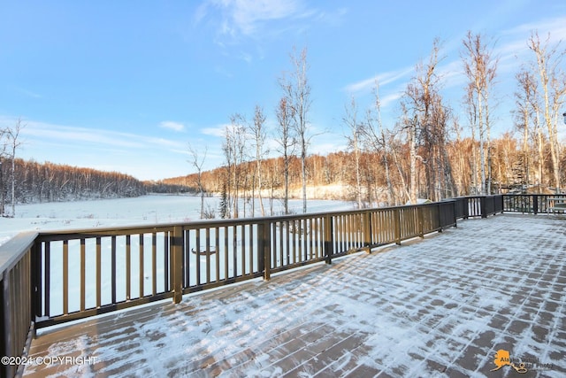 view of snow covered deck