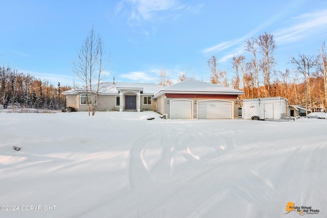 single story home with a garage