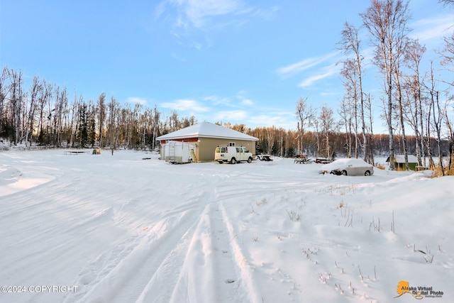 view of yard covered in snow