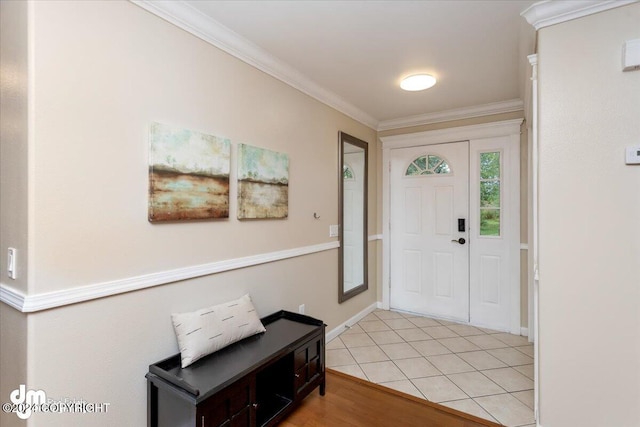 tiled entryway with crown molding