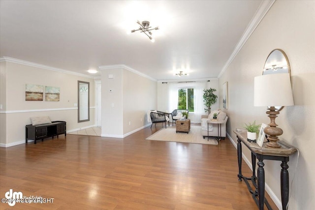 living room with hardwood / wood-style flooring and crown molding