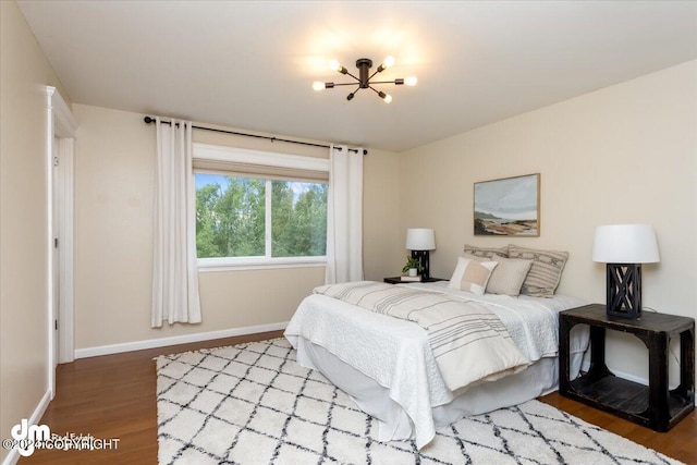 bedroom featuring wood-type flooring