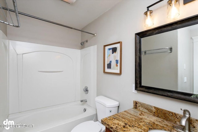 full bathroom featuring vanity, toilet, and washtub / shower combination