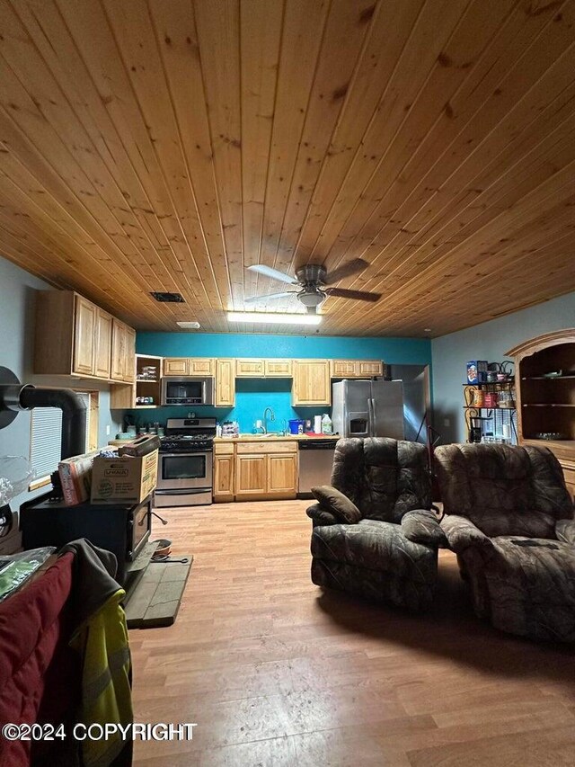 kitchen featuring light brown cabinets, wooden ceiling, light hardwood / wood-style flooring, ceiling fan, and appliances with stainless steel finishes