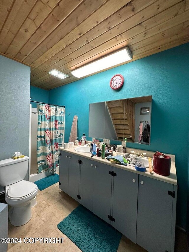 full bathroom with shower / bath combo, vanity, toilet, and wood ceiling