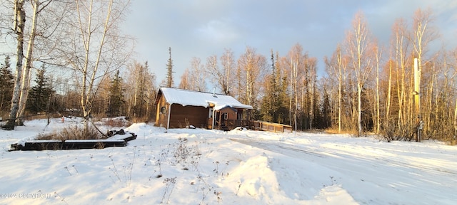 view of yard covered in snow