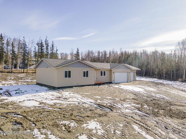 4980 Kelsi Loop, Wasilla, AK 99654 - view of front of house with an attached garage