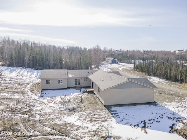4980 Kelsi Loop, Wasilla, AK 99654 - snowy aerial view featuring a view of trees