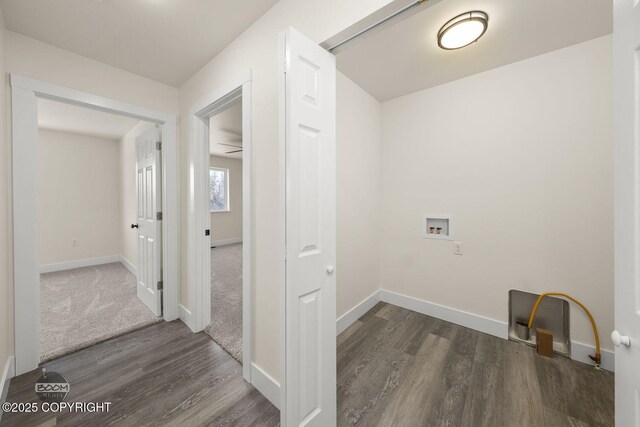 4980 Kelsi Loop, Wasilla, AK 99654 - laundry area with hookup for a washing machine, baseboards, dark wood-style flooring, and laundry area