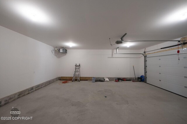 4980 Kelsi Loop, Wasilla, AK 99654 - garage featuring a garage door opener
