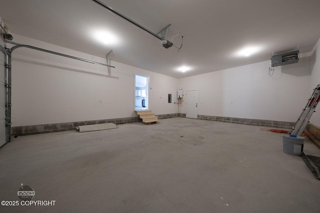 4980 Kelsi Loop, Wasilla, AK 99654 - garage featuring a garage door opener